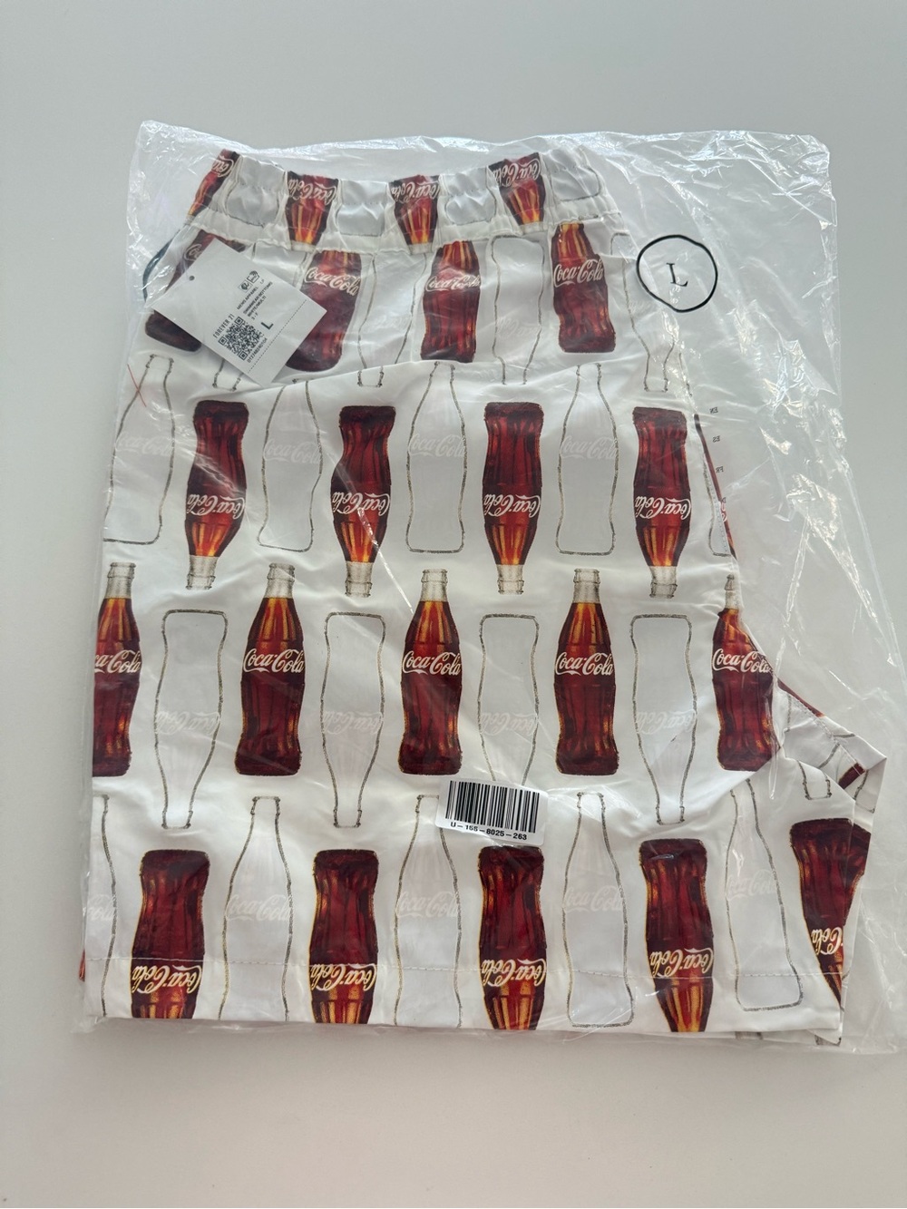 NWT Forever 21 x Coca-Cola collection men’s swim trunks - all over classic print